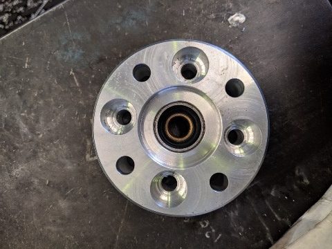 A machined axle wheel hub